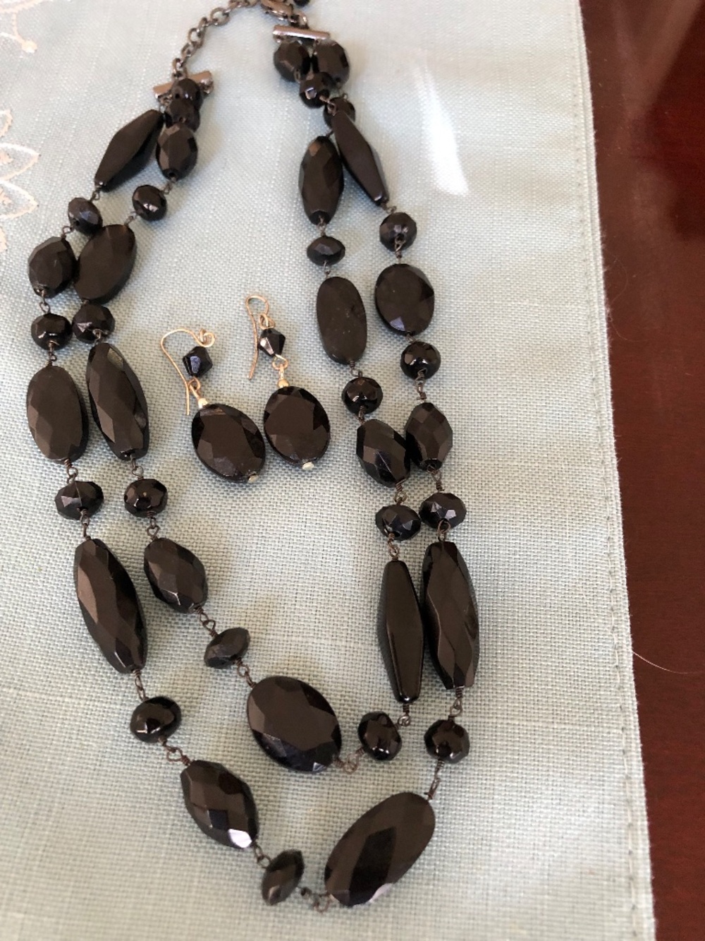 Black beaded necklace and earrings